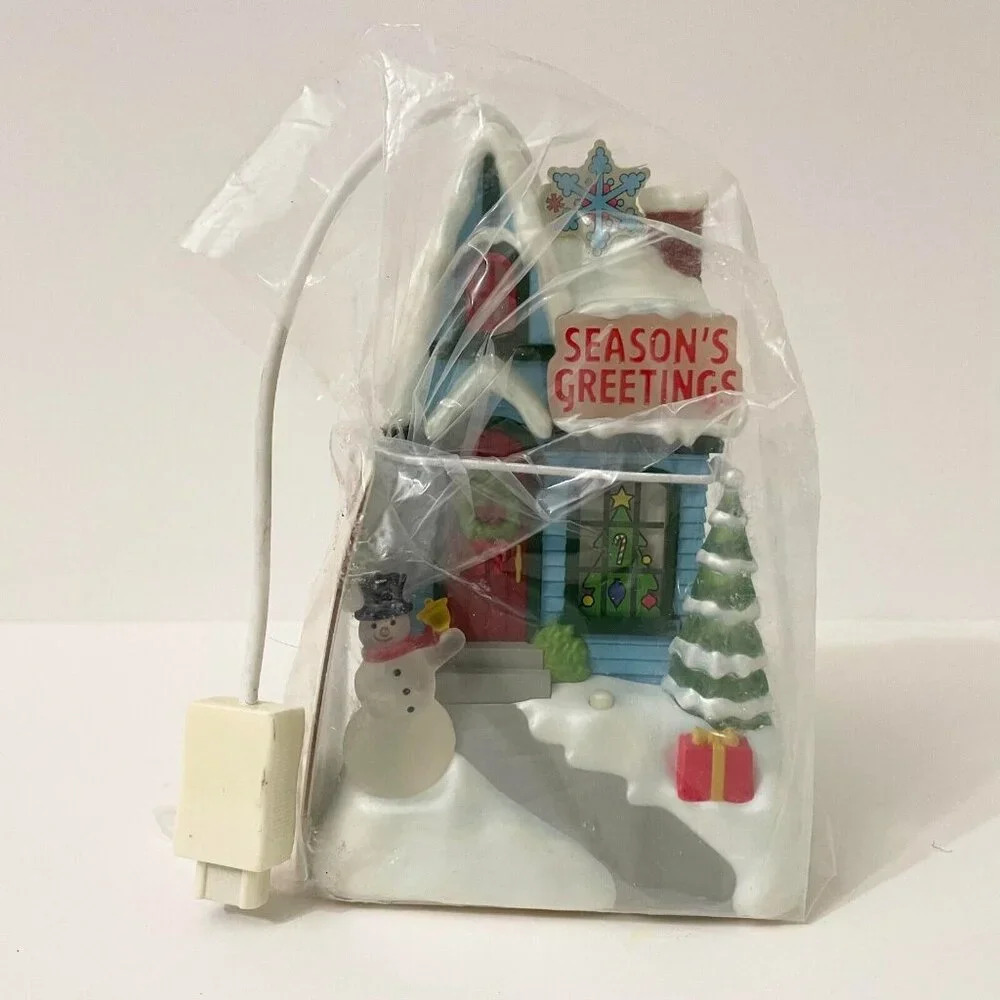 2009 Hallmark Ornament Light and Music Caroling Cottages Seasons Greetings